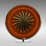 Pueblo charger by Lino Tagliapietra and Marina Angelin, 1984, blown glass, metal, sold Sep 2021