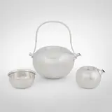 Tea service by Vivianna Torun Bülow-Hübe, c. 1965, silver-plated brass, sold Apr 2025