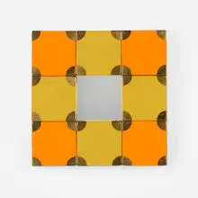 Alexander Girard, Wall mirror for Textiles & Objects, 1961, fabric over wood, brass, mirrored glass