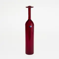 A bottle by Oiva Toikka, ruby coloured glass bottle, offered Oct 2026