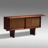 Special cabinet by George Nakashima, 1962, American black walnut, pandanus cloth, sold Sep 2021