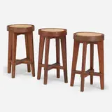 Stools from Punjab University, Chandigarh, set of three by Pierre Jeanneret, c. 1965, teak, cane, sold Sep 2021