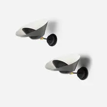 Saturne sconces, pair by Serge Mouille, 1957 / 2017, enameled aluminum and steel, brass, sold Mar 2025
