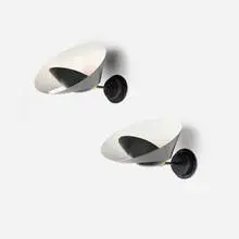 Saturne sconces, pair by Serge Mouille, 1957 / 2017, enameled aluminum and steel, brass, sold Mar 2025