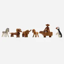 Collection of seven animals by Kay Bojesen, c. 1951, teak, lacquered wood, fruitwood, plastic, sold Mar 2025