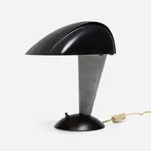 Polaroid desk lamp, model 114 by Walter Dorwin Teague, 1939, painted Bakelite, aluminum, sold Mar 2025