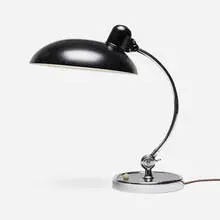 Table lamp, model 6331 by Christian Dell, lacquered steel, chrome-plated brass, plastic, sold Mar 2025