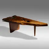 Exceptional Conoid coffee table by George Nakashima, 1969, English walnut, sold Sep 2021