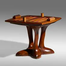 Wendell Castle, Game table, 1975, laminated and sculpted walnut, purpleheart wood, wenge, felt, leather, burl