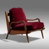New Hope chair by Phillip Lloyd Powell, c. 1975, sculpted walnut, ebony, velvet, sold Sep 2021