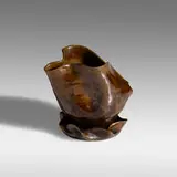 Pitcher by George E. Ohr, 1895-96, glazed earthenware, sold Sep 2021