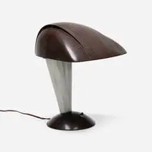 Polaroid esk lamp, model 114 by Walter Dorwin Teague, 1939, Bakelite, aluminum, sold Mar 2025