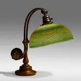 Damascene desk lamp by Tiffany Studios, c. 1910, hand-blown Favrile glass, patinated bronze, sold Sep 2021