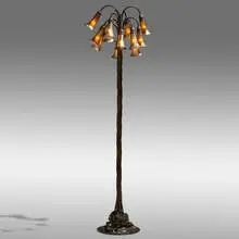 Tiffany Studios, Twelve-light Lily floor lamp, c. 1910, gilt bronze, hand-blown Favrile glass