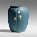 Rare vase with crocuses by Eva Russell for Grueby Faience Company, c. 1905, glazed earthenware, sold Sep 2021