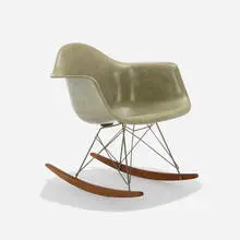 RAR by Charles and Ray Eames, 1950, molded fiberglass with rope edge, birch, zinc-plated steel, sold Feb 2025