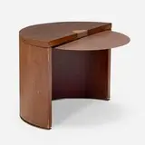 Andree Putman, Occasional table from the Hotel Wasserturm, Cologne, 1989, wenge veneer, enameled steel, brass-plated aluminum