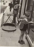 Louis Stettner, Boy reading Comics, Paris