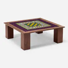 Coffee table by Garry Knox Bennett, 2004, goncalo alves, rosewood, reverse-painted glass, offered Jul 2026