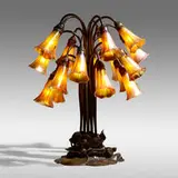 Eighteen-light Lily table lamp by Tiffany Studios, c. 1910, patinated bronze, hand-blown Favrile glass, sold Sep 2021