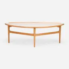 Coffee table by Finn Juhl, 1951, teak, laminate, sold Feb 2025