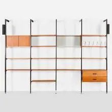 CSS (Comprehensive Shelving System) by George Nelson & Associates, 1959, walnut, enameled and brushed aluminum, enameled steel, glass, sold Feb 2025