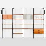 CSS (Comprehensive Shelving System) by George Nelson & Associates, 1959, walnut, enameled and brushed aluminum, enameled steel, glass, sold Feb 2025