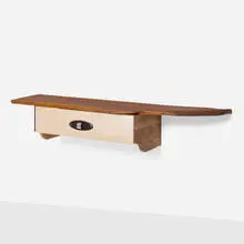 Shelf by Phillip Lloyd Powell, c. 1990, walnut, ash, ebony, aluminum, offered Mar 2025