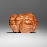 Untitled (Orange Marble Striated Sculpture) by Amalia de Schulthess, 1974, striated orange marble, offered Sep 2024