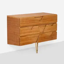 Wall-mounted cabinet by Gio Ponti, c. 1953, mahogany, brass, sold Feb 2025