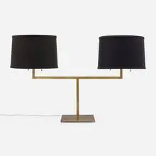 Table lamp by T. H. Robsjohn-Gibbings, c. 1955, brass, paper shades, sold Feb 2025