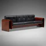 Sofa for Hotel SESC, Rio de Janeiro by Oscar and Anna Maria Niemeyer, 1990, rosewood, leather, sold Feb 2025