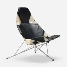 Wendell Lovett, Bikini chair, vulcunized plastic, leather upholstery, powder-coated steel, rubber