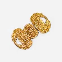 Belt buckle by Line Vautrin, c. 1950, gilt bronze, sold Feb 2025