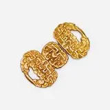 Line Vautrin, Belt buckle