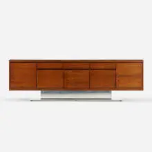 Cabinet by Warren Platner, c. 1970, walnut, polished aluminum, leather, sold May 2021