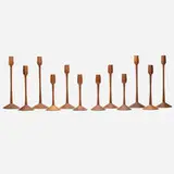 Herbert Simonson, Collection of twelve candleholders, hand turned walnut