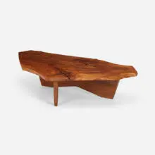 Conoid coffee table by George Nakashima, 1971, American black walnut, rosewood, sold Feb 2025