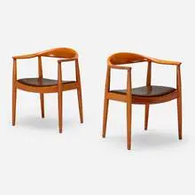 The Chairs, pair by Hans J. Wegner, 1949, teak, leather, sold Feb 2025