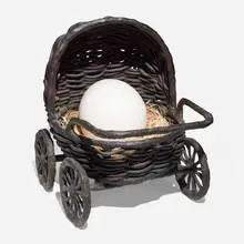 Liz Craft, Baby Carriage, 2008, bronze, porcelain, raffia