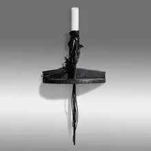Wall Torchère by Albert Paley, 1992, forged and fabricated steel with a blackened finish, slate, sold May 2021