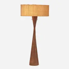 Large table lamp by Phillip Lloyd Powell, c. 1960, laminated and turned walnut, patinated metal, woven grass over fiberglass, sold May 2021