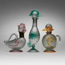 Flavio Poli, Bird decanters, set of three, c. 1962, internally decorated glass with applied details, metal