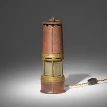 Table lamp by Paul Dupré-Lafon for Hermès, c. 1940, leather, brass, glass, offered Mar 2024