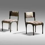 Sculpted Bronze chairs, pair by Paul Evans, c. 1970, bronzed resin over steel, upholstery, sold May 2021