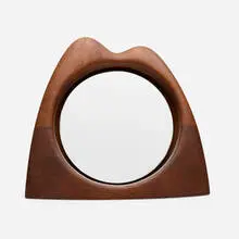 Wendell Castle, Mirror, 1974, walnut, mirrored glass