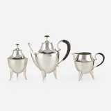 Josef Hoffmann, Three-piece tea service, c. 1920, hand-hammered silver, ebony