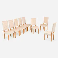attribution Jacques Adnet, Dining chairs, set of eight, c. 1940, cerused oak, leather upholstery, brass, brass-plated steel