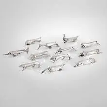 Gallia animalier figural knife rests, set of twelve by Édouard-Marcel Sandoz, c. 1930, silver-plated metal, sold Jan 2025