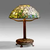 Tulip table lamp by Tiffany Studios, c. 1910, leaded glass, patinated bronze, sold May 2021